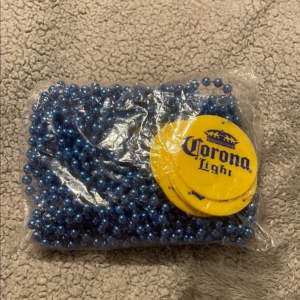 12 Corona Light Yellow Coasters with Blue Beads necklace